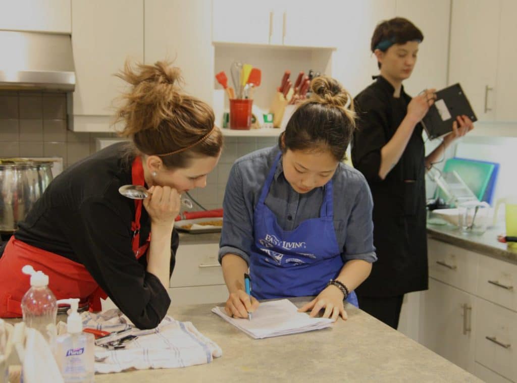 Volunteers helping in a kitchen