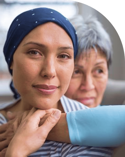 A woman wearing a bandana on their head