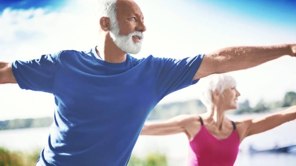 Two seniors exercising