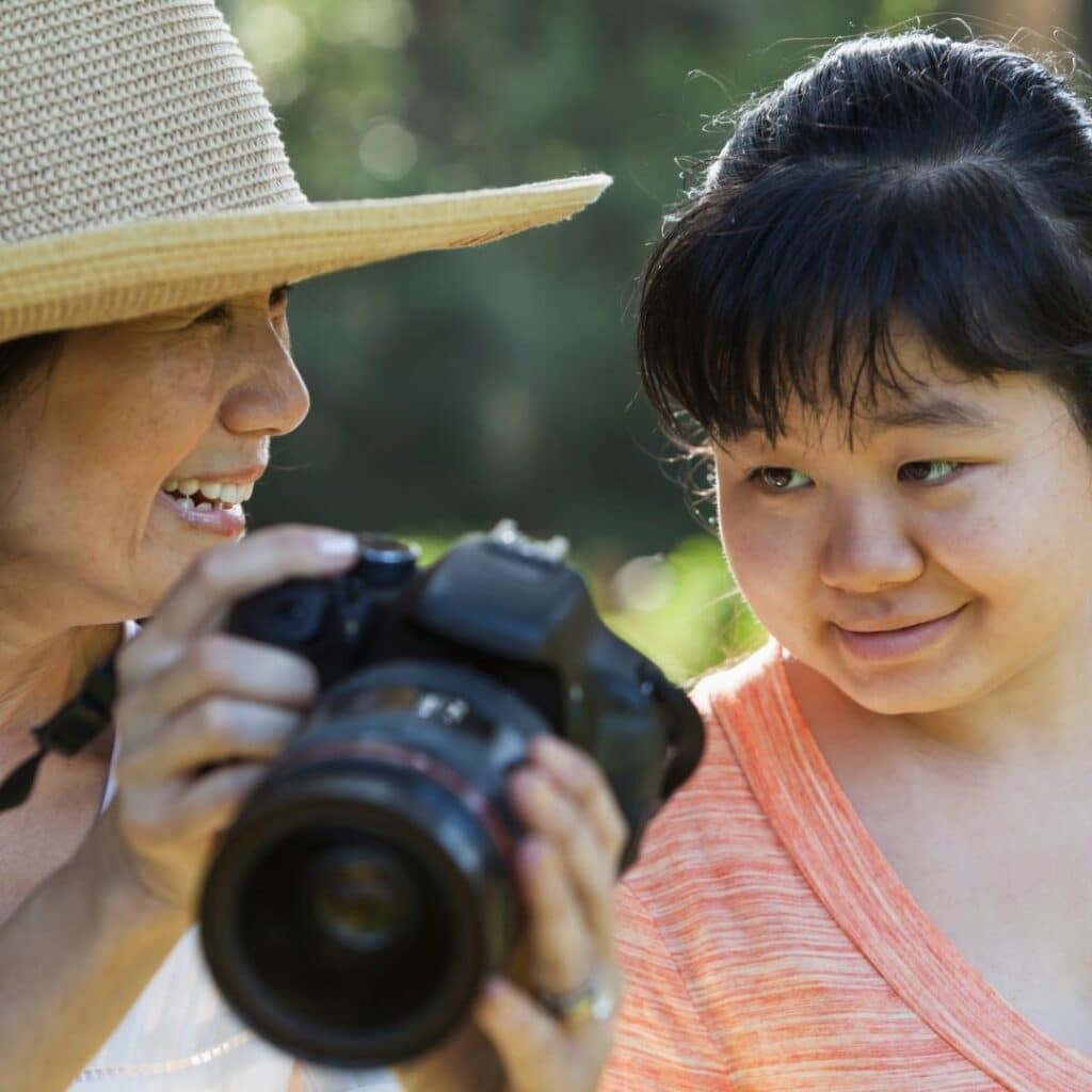 Two women looking at a camera